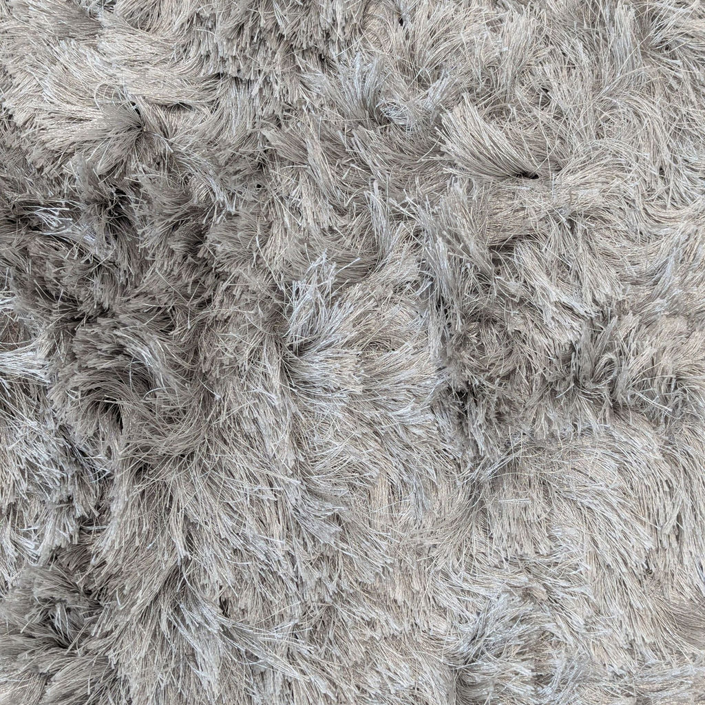 Soft modern nuLOOM area rug with cozy, high-pile texture in light gray, suitable for most décor.