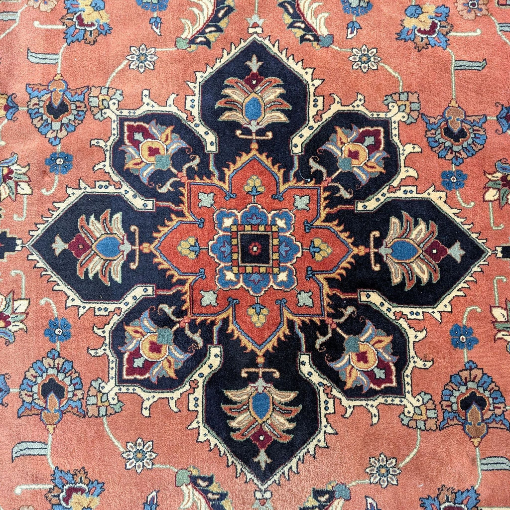 Classic Persian rug in red, blue, and black, showcasing ornate motifs, fringed ends, and a soft, durable texture.