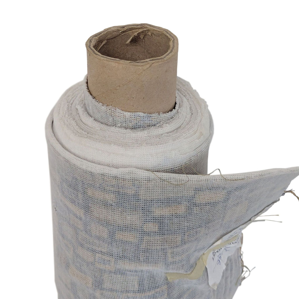 Durable fabric roll by Gildar Designs, displaying rectangles in earthy hues on beige, perfect for contemporary décor projects.