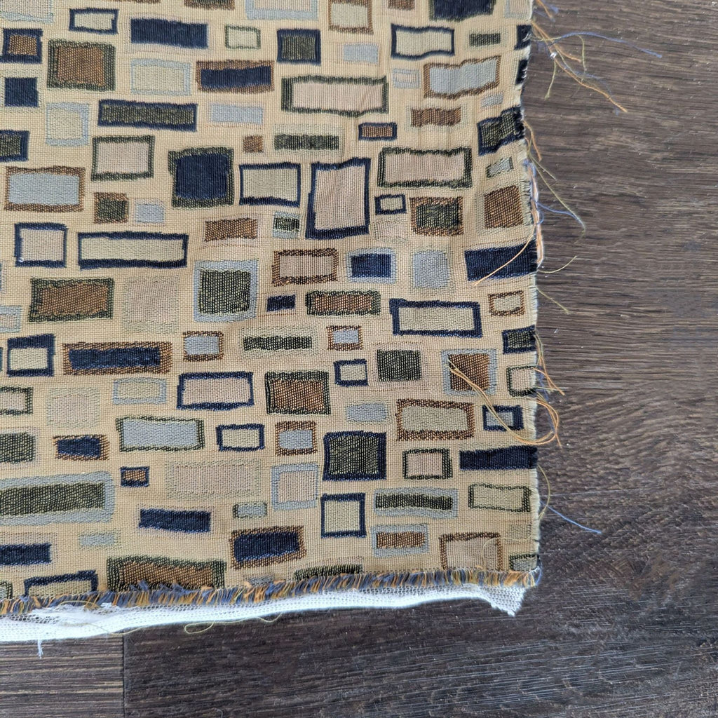 Geometric Gildar Designs fabric featuring multicolored rectangles on a beige background, suitable for crafts or upholstery.