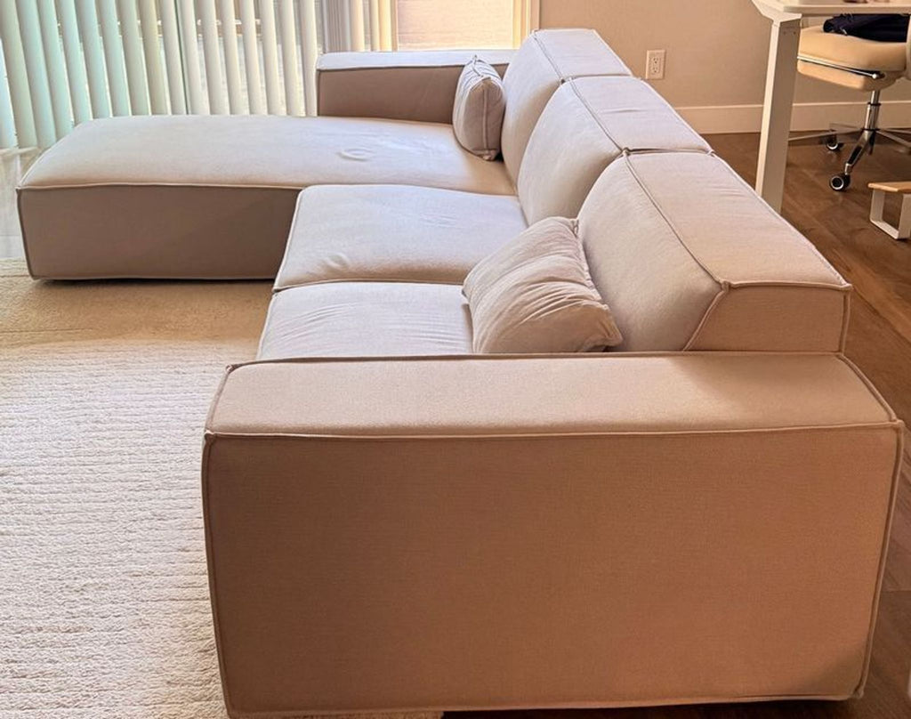 Close-up view of Rove Concepts Porter sectional, detailing fabric texture and slight removable pilling.