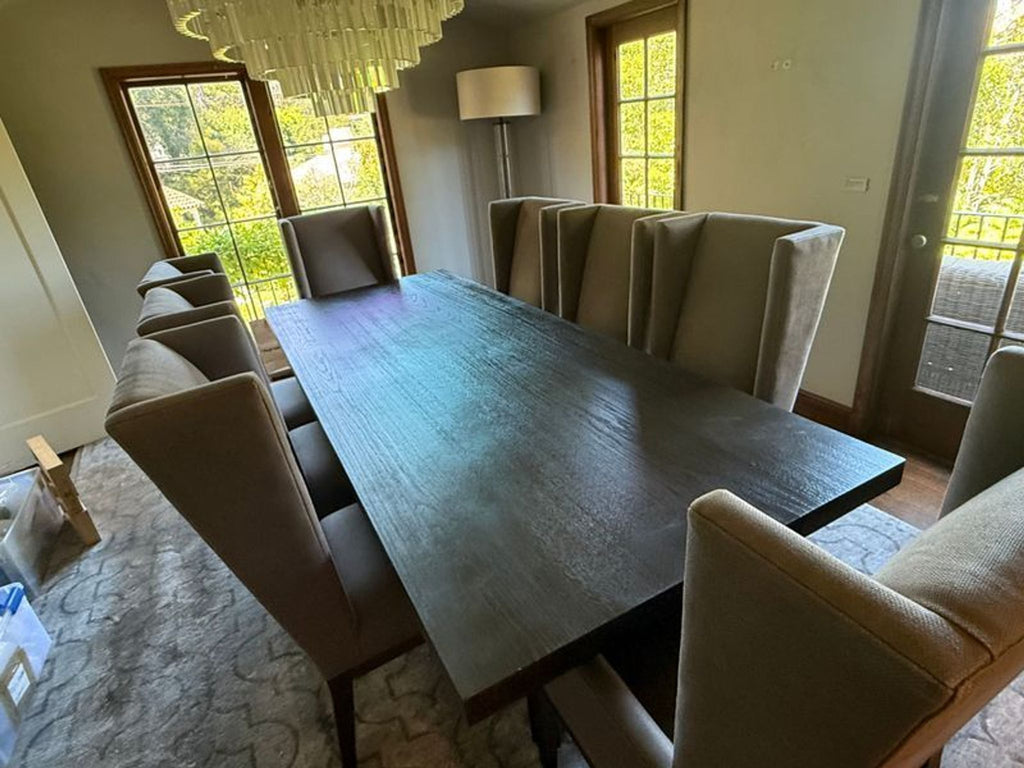 2. Luxurious $25000 wooden RH Dining set, perfect for formal dining rooms.