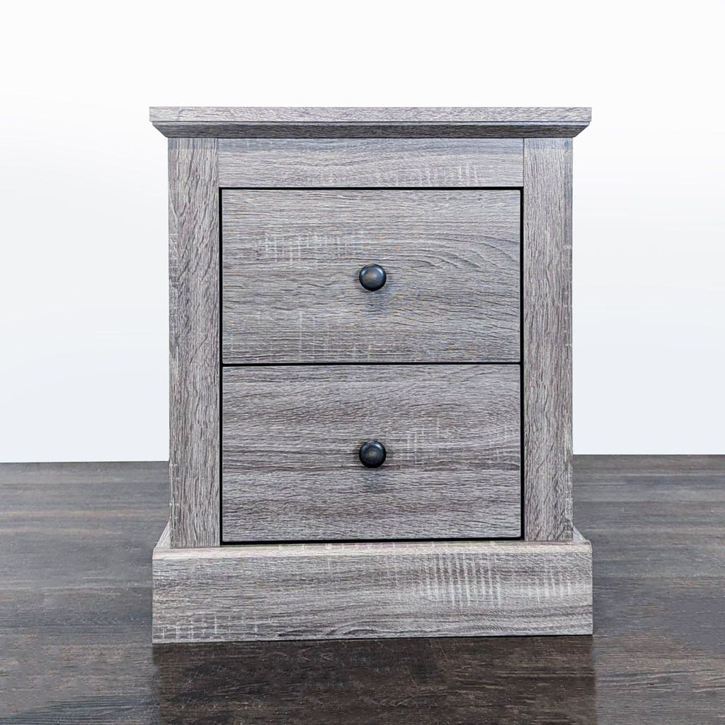 1. Modern Modus Furniture end table featuring sleek lines and a compact design for versatile use in any room.