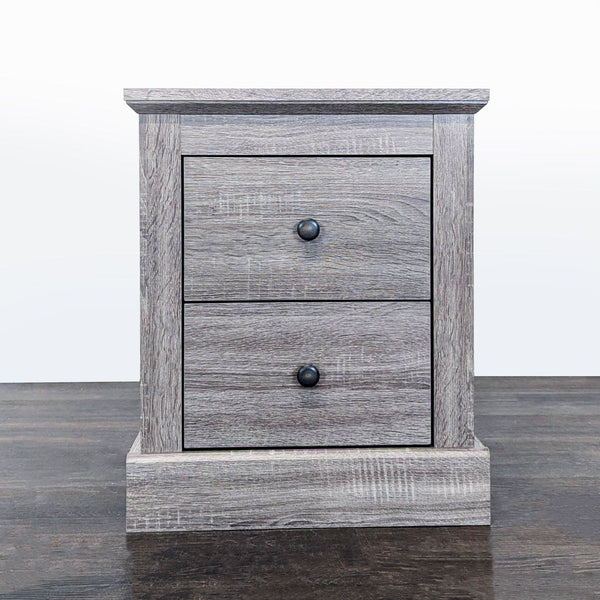 1. Modern Modus Furniture end table featuring sleek lines and a compact design for versatile use in any room.