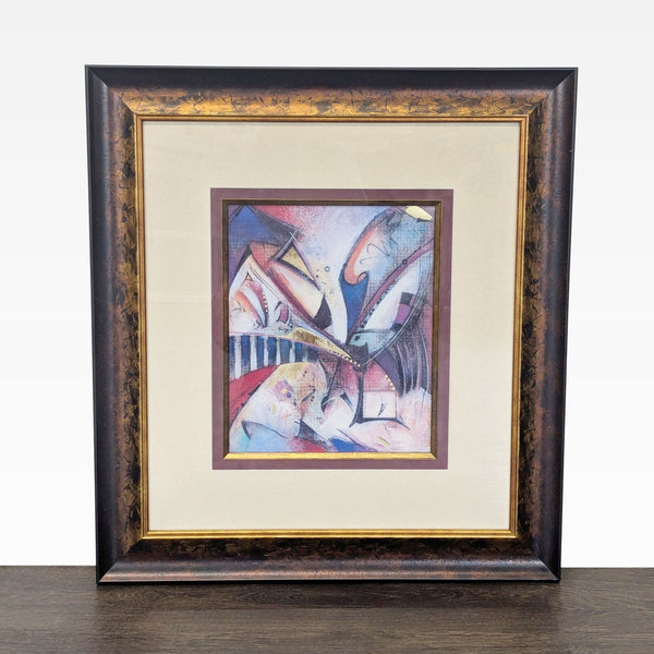 Abstract mixed-media artwork "Gravity" with blue, burgundy, blush, black, and gold in a dark wood gilt frame.