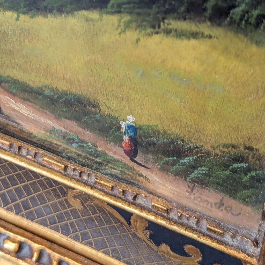 Two classic landscape artworks in detailed gold-toned frames, featuring peaceful rural views with small figures.  