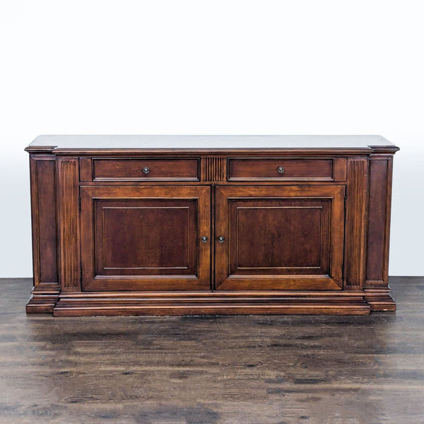 Ethan Allen sideboard and credenza with classic wood finish, two drawers, and double-door cabinets for storage.