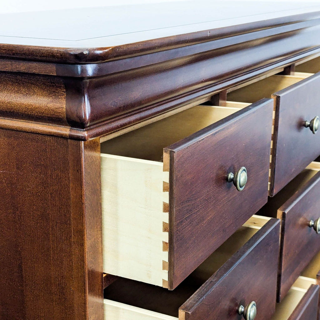 Stanley Furniture Squire 14-Drawer Solid Wood Dresser in Rich Cherry Finish