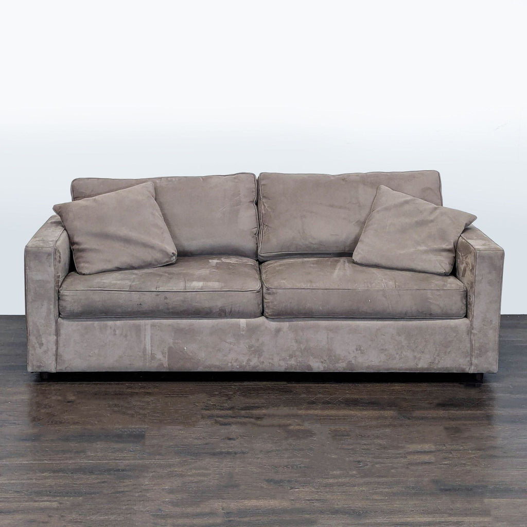 Modern Room & Board 3-seat sofa in soft neutral fabric with track arms and plush cushions, includes two throw pillows.