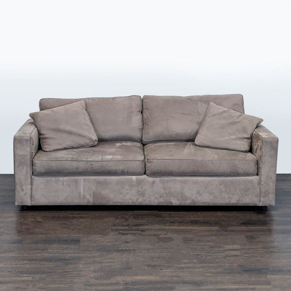 Modern Room & Board 3-seat sofa in soft neutral fabric with track arms and plush cushions, includes two throw pillows.