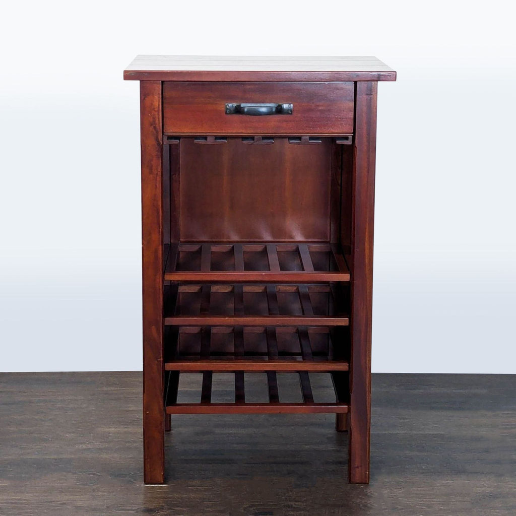 Pottery Barn cabinet with one drawer, glassware storage, and rack for 20 bottles.  