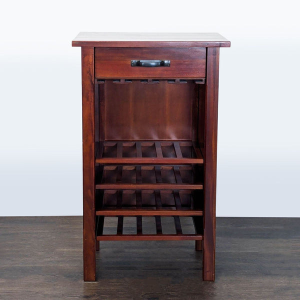 Pottery Barn cabinet with one drawer, glassware storage, and rack for 20 bottles.  