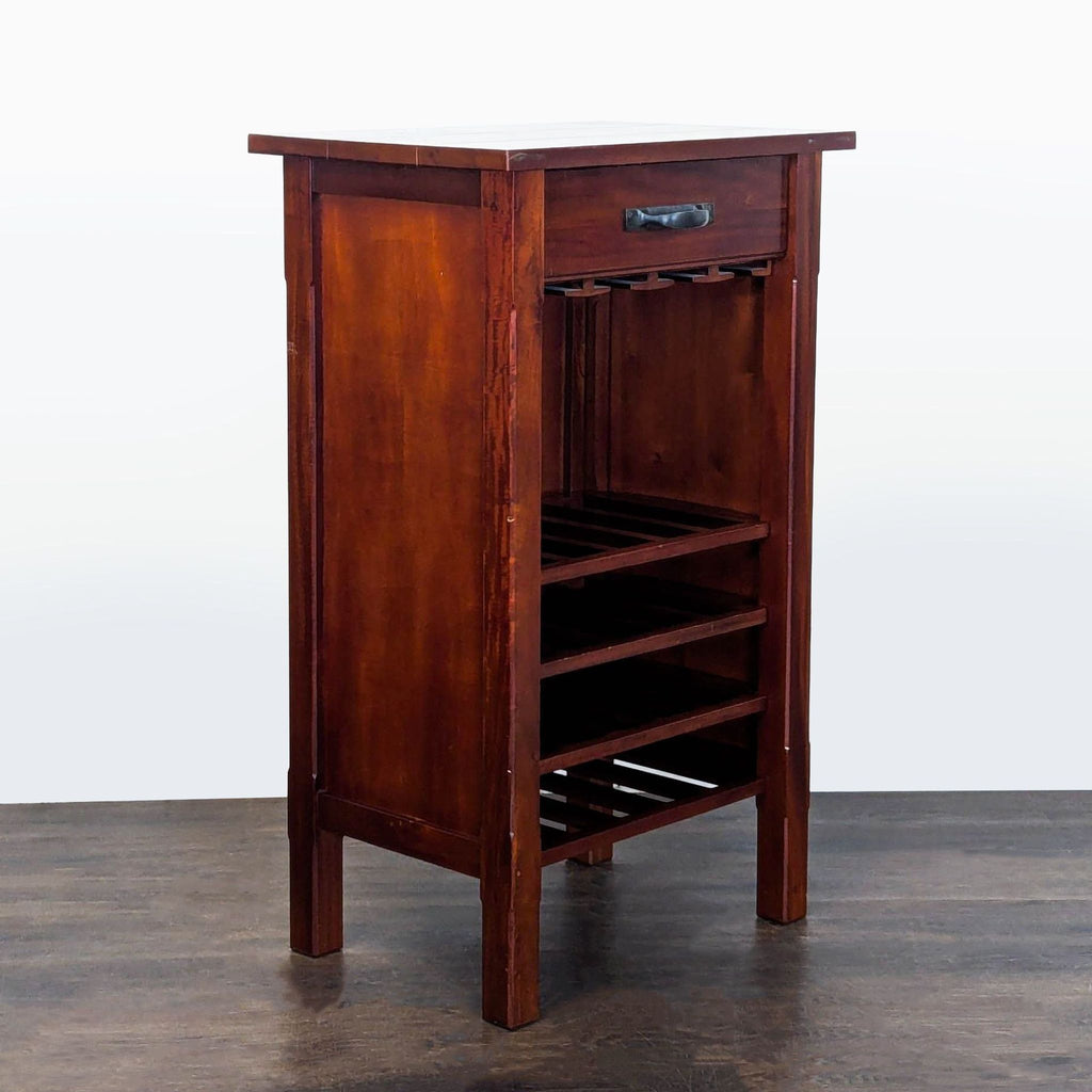 Modern cabinet featuring a single drawer and compartments for glassware and wine bottles.  