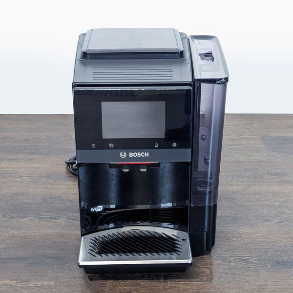 Bosch black coffee maker with touch display, compact design, and WiFi for smart features, ideal for home or office.
