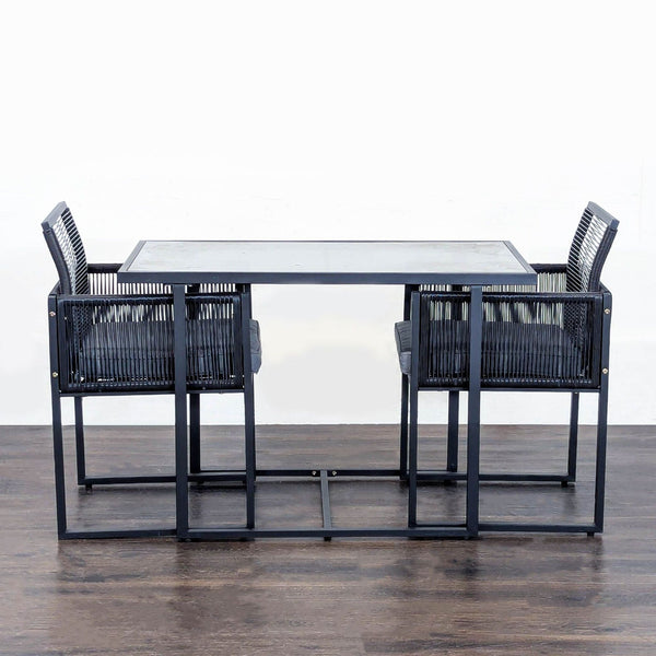 Costway 3-piece patio set with glass-top table and two cushioned chairs, ideal for indoor or outdoor use.