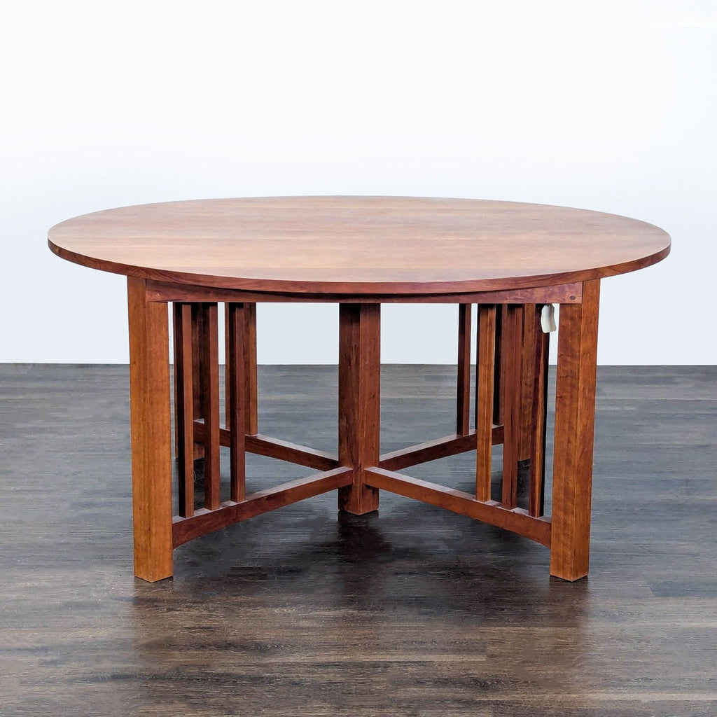 1. Thos Moser wooden dining set with matching chairs, showcasing craftsmanship and elegance.