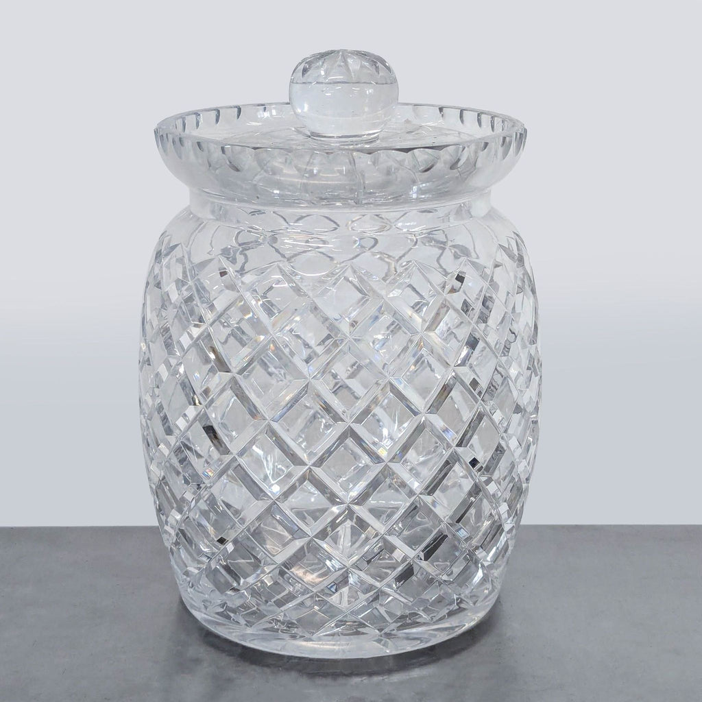 Ceska glass jar with cut crystal lattice pattern and matching lid, perfect for elegant storage.