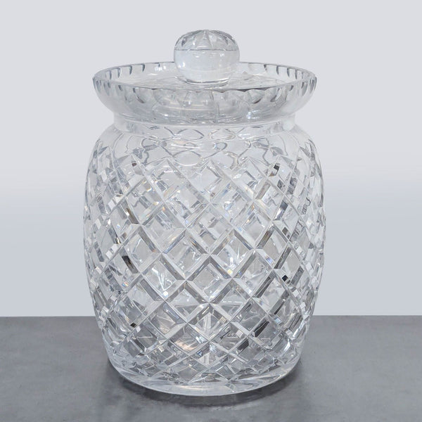 Ceska glass jar with cut crystal lattice pattern and matching lid, perfect for elegant storage.