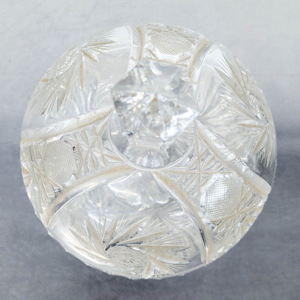 Classic pedestal crystal bowl set with ornate patterns, combining functionality and vintage charm for home décor.