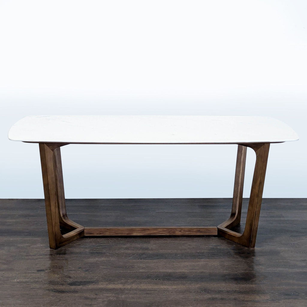 Sealed marble top dining table on ash wood base by Rove Concepts.  