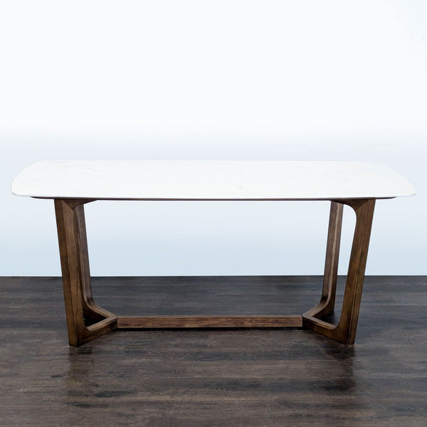 Sealed marble top dining table on ash wood base by Rove Concepts.  
