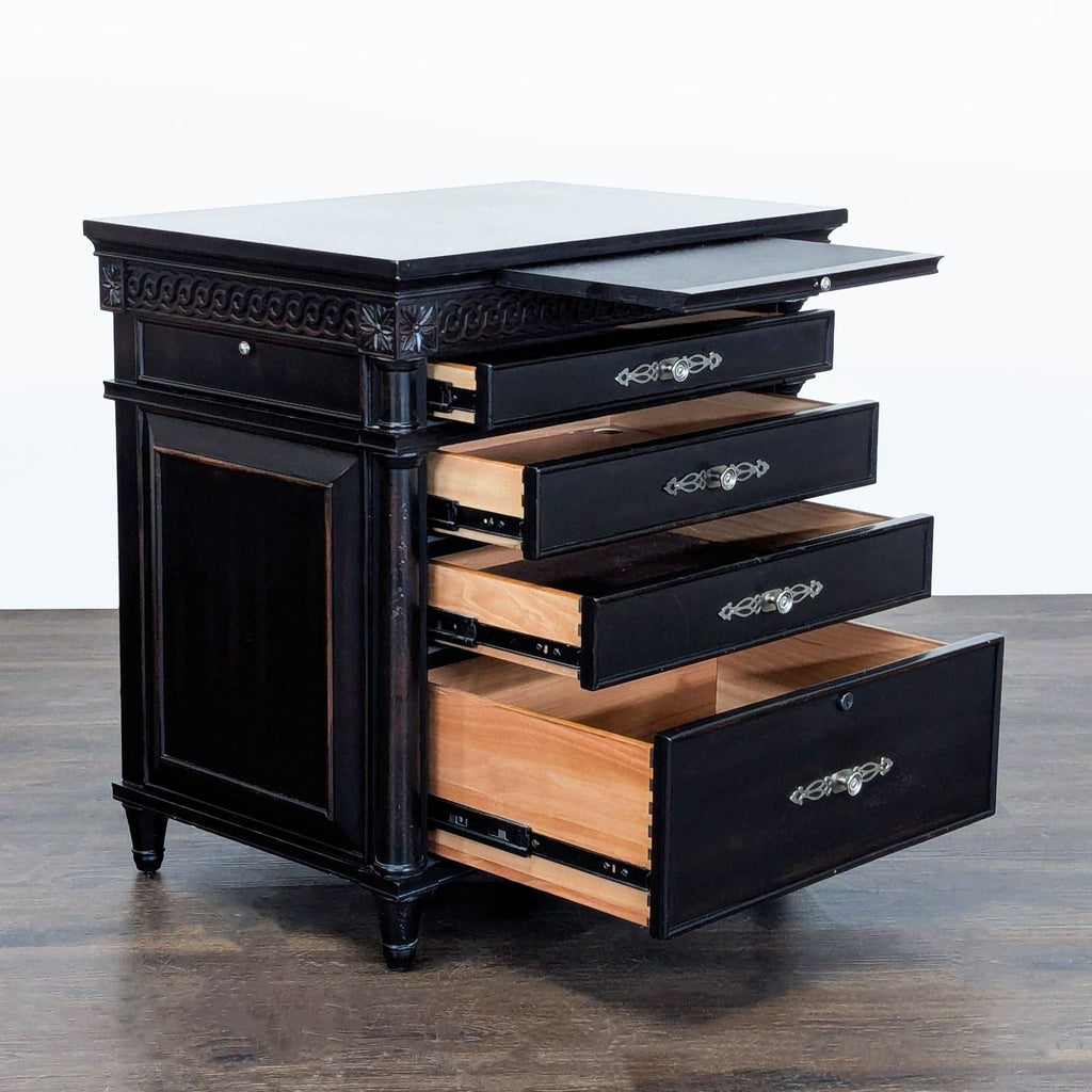 Sleek end table by Aspen Home, featuring a black finish, decorative handles, and built-in power tray.