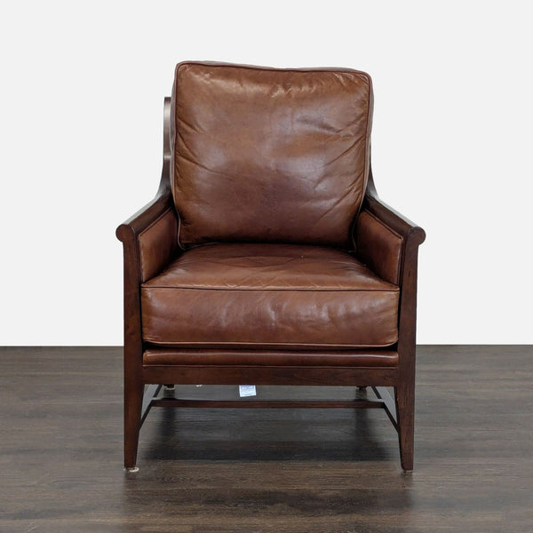 Brown leather lounge chair with plush cushions and a wooden frame, ideal for stylish living room comfort.
