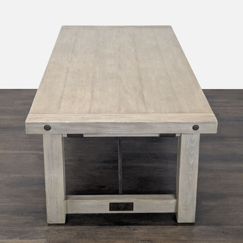 Dining set by Pottery Barn: features industrial metal accents, six chairs, and a farmhouse-inspired wooden table.