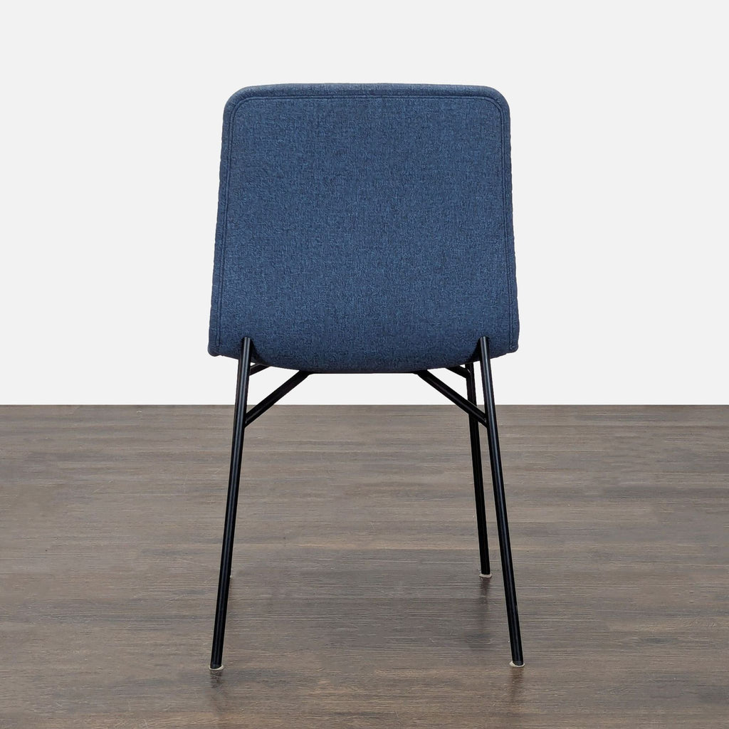 Room & Board Cato dining chair with gentle seat curves and crisp lines, upholstered in Medley Ink.