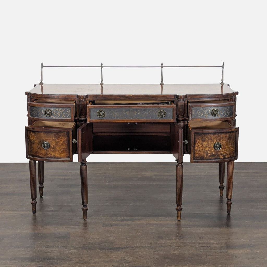 Classic credenza with decorative metal details, five drawers, central cabinet, raised gallery back, and keys.