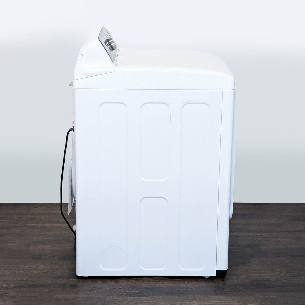 Samsung washer/dryer appliance in white with a clear door and multiple cycle settings, designed for high capacity.