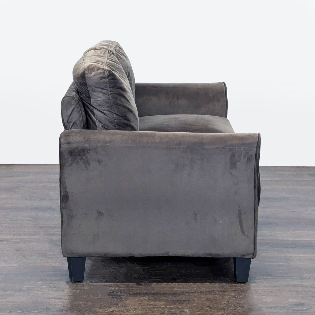 Lifestyle Solutions loveseat, upholstered in soft material, seats two comfortably in any room.
