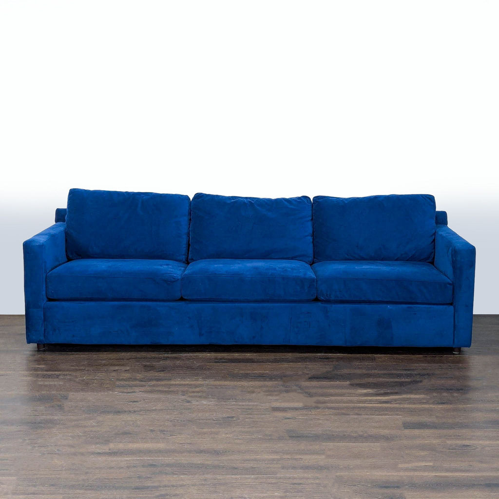 Crate & Barrel 3-seat sofa with two swivel chairs, paired with Pottery Barn coffee and end tables.