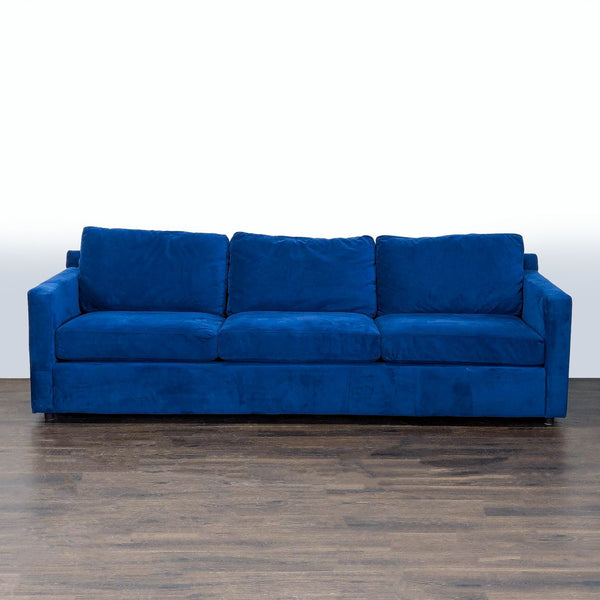 Crate & Barrel 3-seat sofa with two swivel chairs, paired with Pottery Barn coffee and end tables.