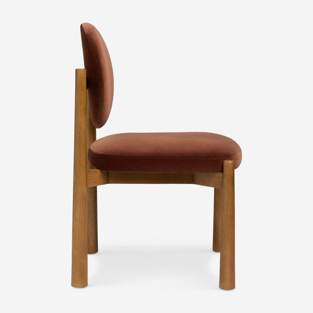 1. Modern Lulu and Georgia dining chair with sleek wooden frame and cushioned seat, perfect for contemporary spaces.