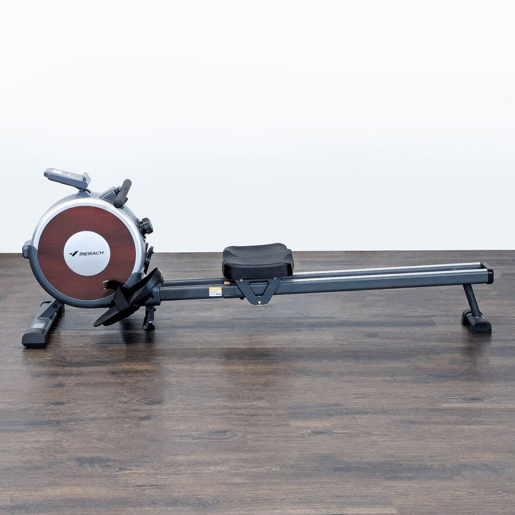 Home rowing machine by Merach, designed for full-body exercise with easy controls and comfortable seating.