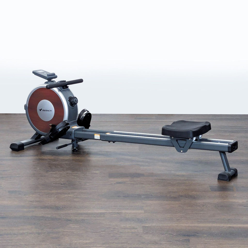 Gym Equipment: Merach magnetic rower featuring ergonomic handles and durable build for all fitness levels.  