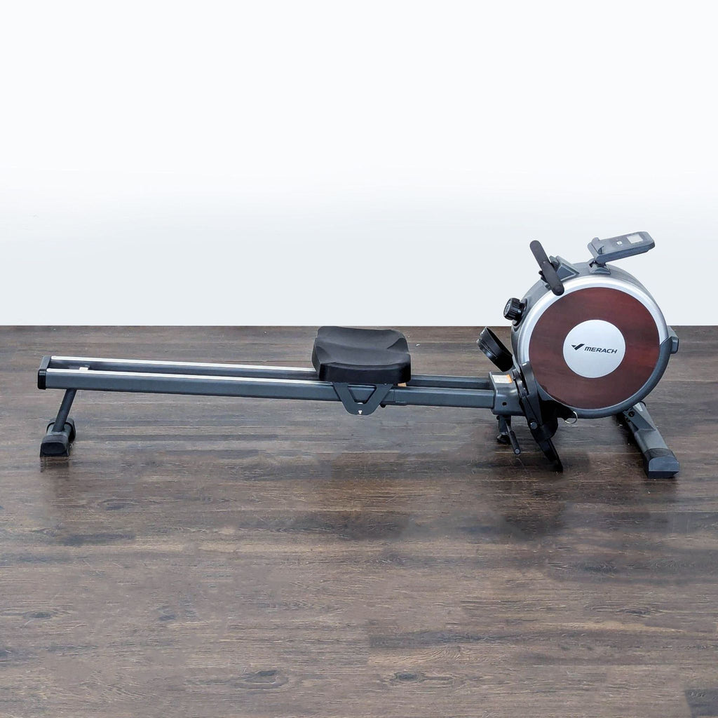 Merach Magnetic Rowing Machine with padded seat and smooth rail, ideal for quiet home cardio and strength workouts.  