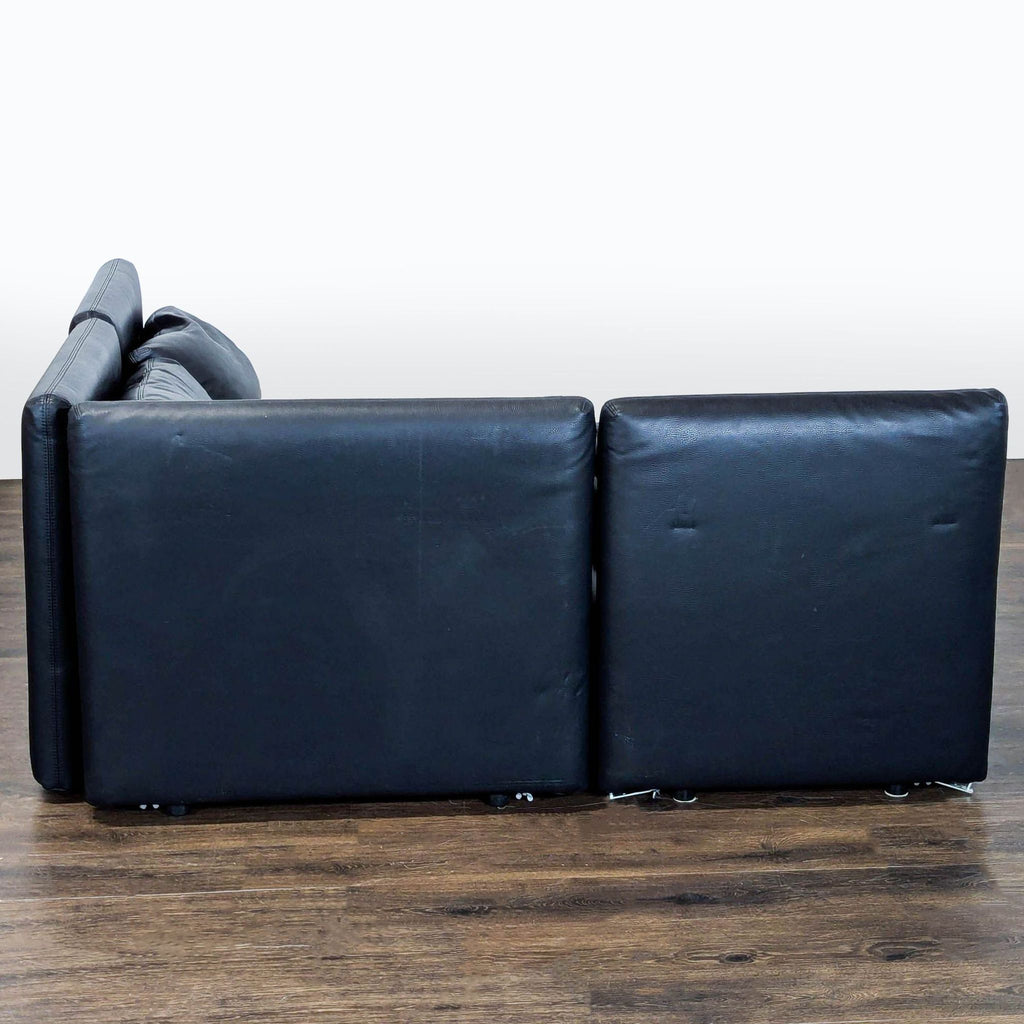 Excellent condition! 


Versatile modular sectional sofa is upholstered in black faux leather. This set includes a storage ottoman and a pull-out sleeper module. The modular design allows for various configurations to fit different living spaces. 

D