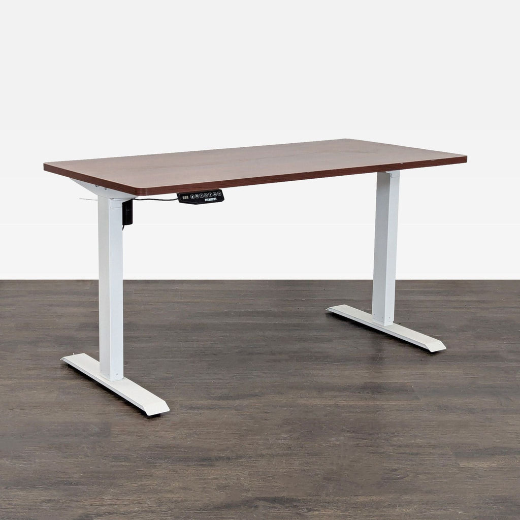 Modern Flexispot desk featuring spacious wood surface, sturdy white base, and easy electric height controls.