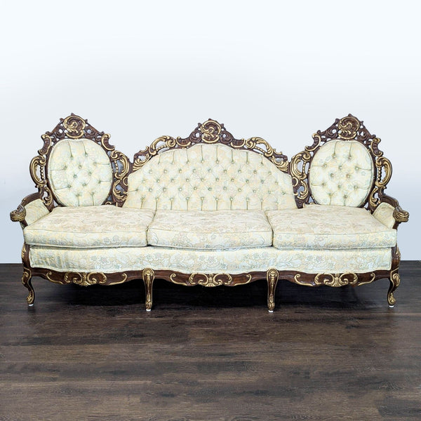 Vintage Hausske-Harlen 3-seat sofa with ornate wood carving, floral upholstery, and gold accents.
