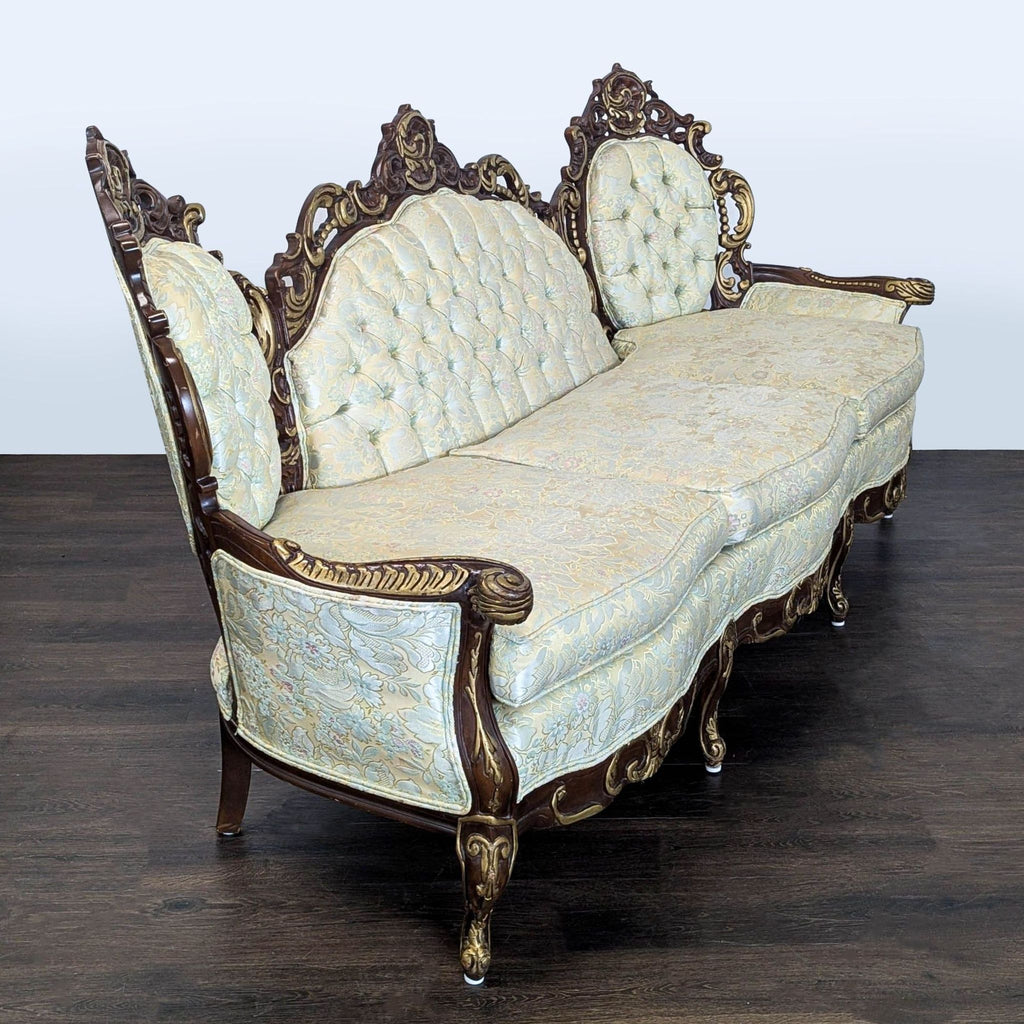 Elegant Victorian-style 3-seat sofa by Hausske-Harlen with tufted back, gold accents, and sturdy frame.