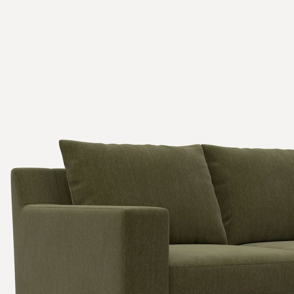1. Modern gray Burrow sectional sofa with chaise lounge in a minimalist living room setting.