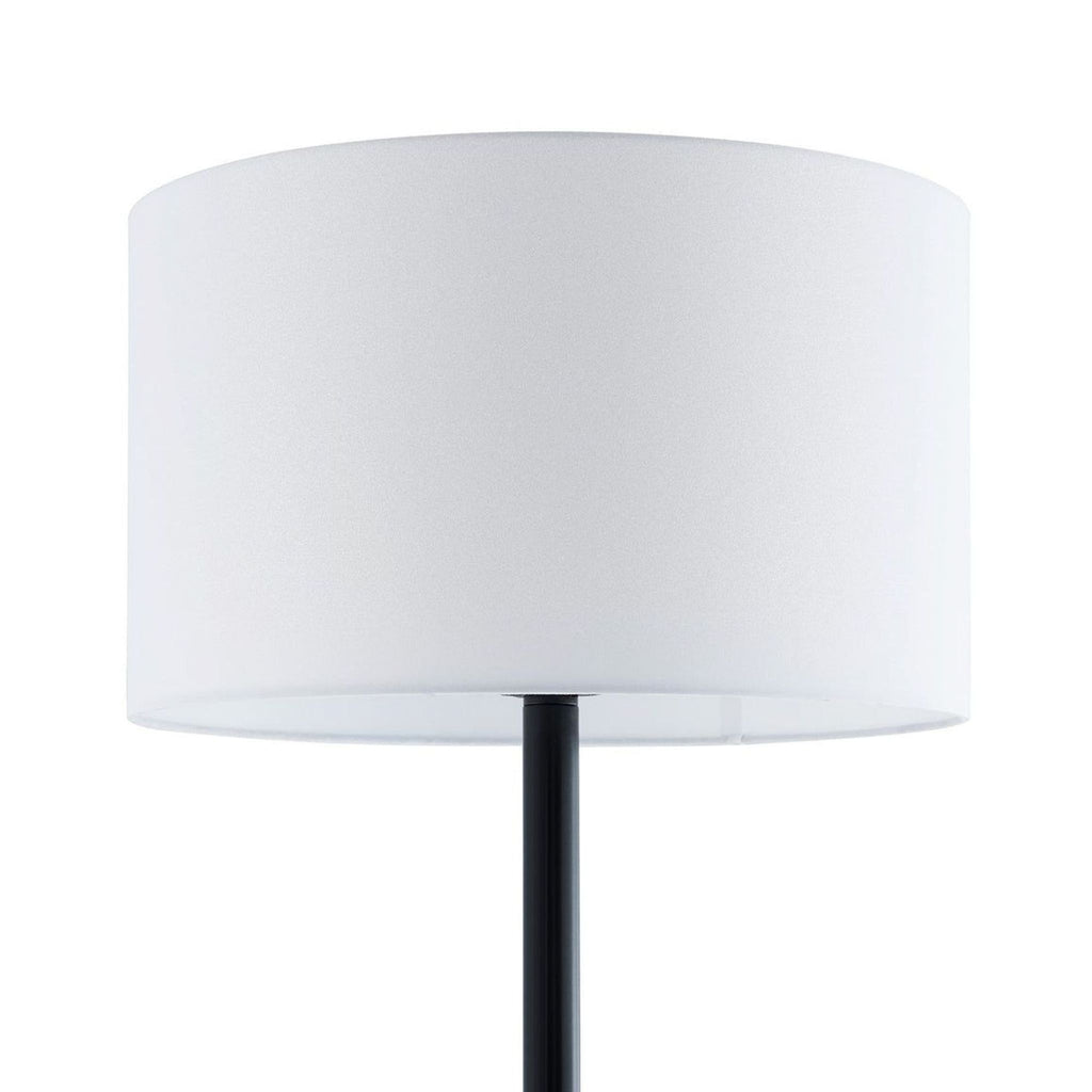 Modern floor lamp with a white drum shade and black base by Bison Commerce, ideal for any room.