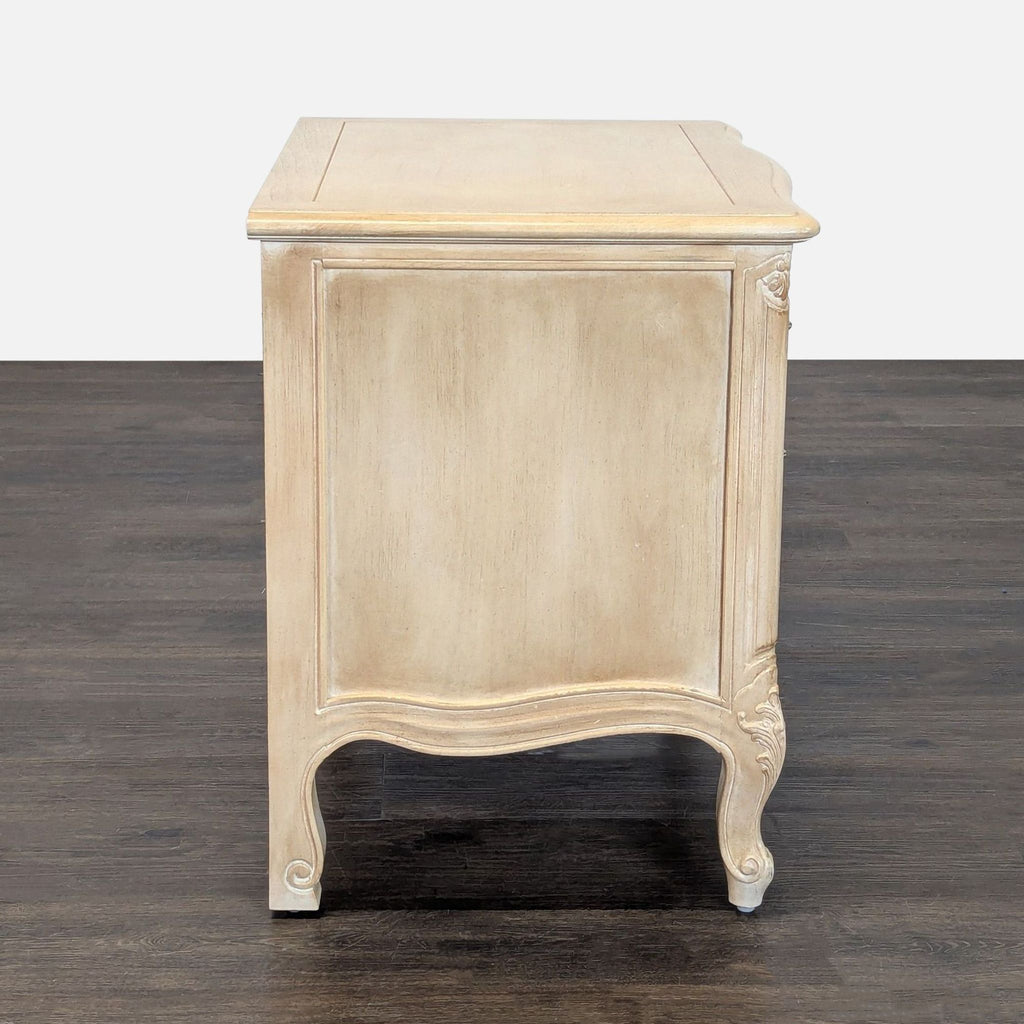 2. Stylish Henredon end table, showing sturdy legs and a smooth rectangular top, ideal for living spaces.  