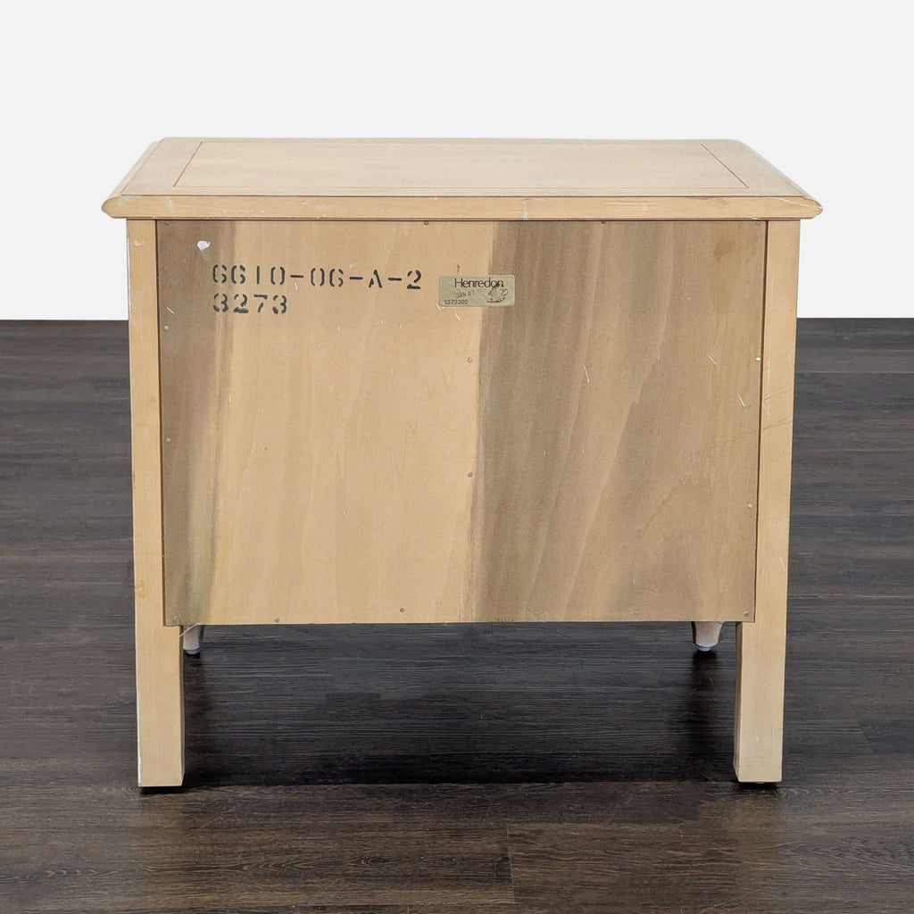 3. Wooden end table by Henredon, with subtle detailing and a functional storage shelf beneath the tabletop.