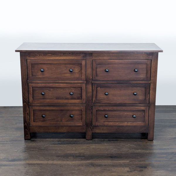 1. Modern Room & Board dresser with clean lines, wooden finish, and multiple spacious drawers for storage.
