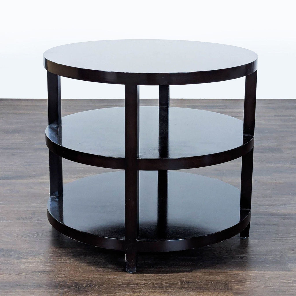 2. Sleek black metal end table with a glass top, styled next to a sofa in a living room.