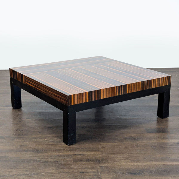 Square rosewood coffee table with bold wood grain and ebonized oak legs by Christian Liaigre for Holly Hunt.  