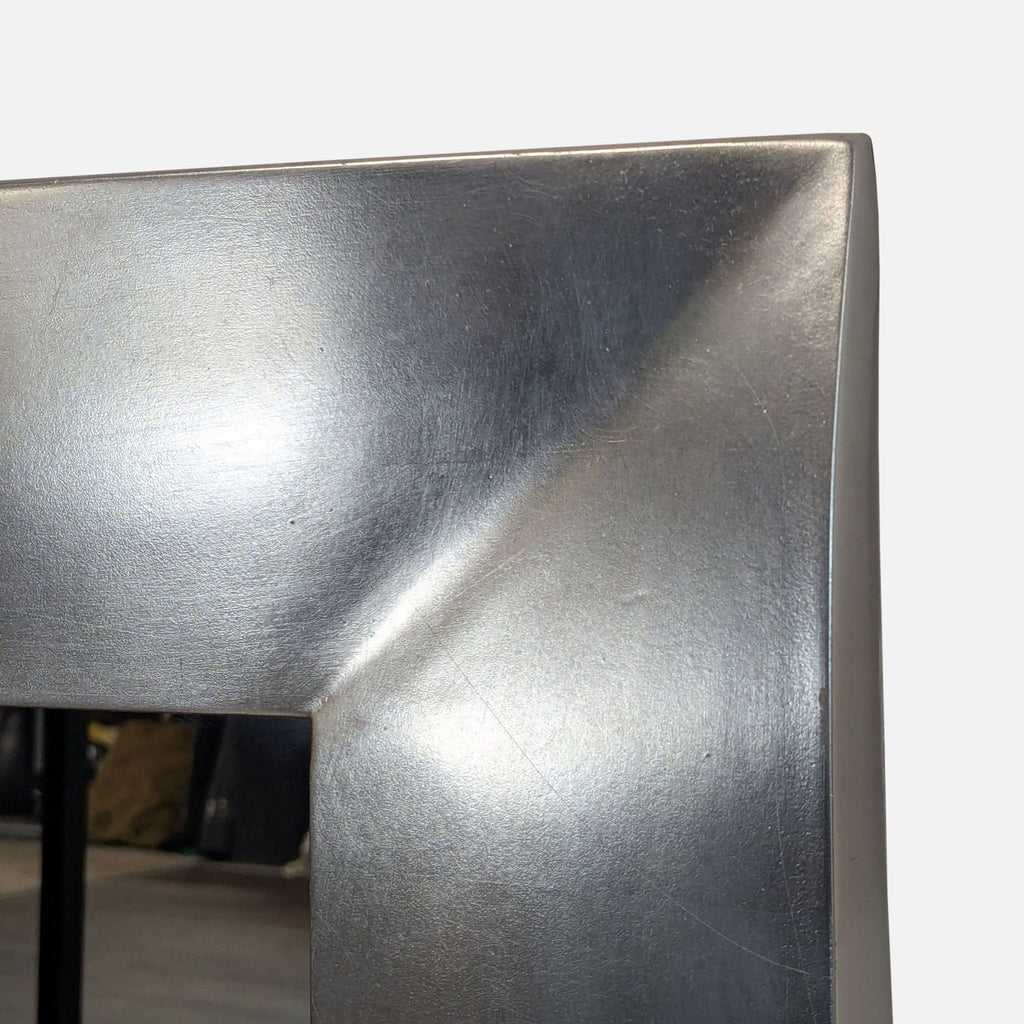 Elegant wall-mounted mirror with a simple, contemporary frame, perfect for any living space.
